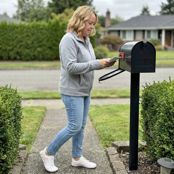 I ran to my mailbox. My husband watched from the window.